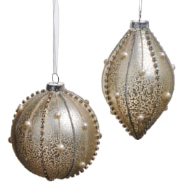 Two gold decorative Christmas ornaments with pearl accents and ribbon hangers