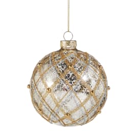 Gold and silver patterned Christmas ornament hanging on a string
