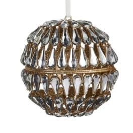 Ornate gold ornament covered in clear teardrop crystals
