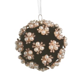Black ornament covered with pearl and rhinestone floral clusters
