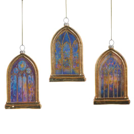 Three stained-glass style arched ornaments with gold frames hang on cords
