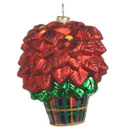 Red poinsettia ornament in a decorated pot