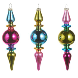 Three colorful glass finial ornaments on a white background