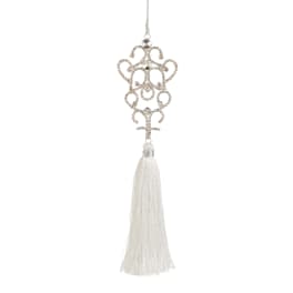 Decorative crystal ornament with a white tassel
