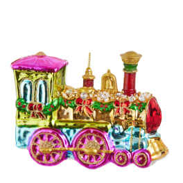Colorful toy train ornament with glitter accents on a white background