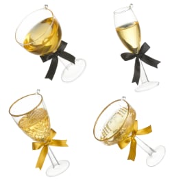 Four champagne flute ornaments with black and gold ribbons