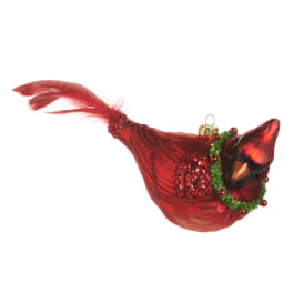 Red cardinal Christmas ornament with glitter and a green garland