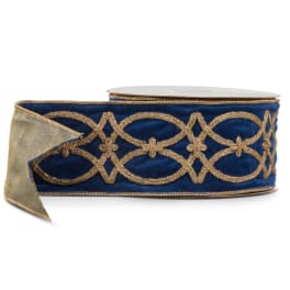Blue and gold decorative ribbon spool on a white background