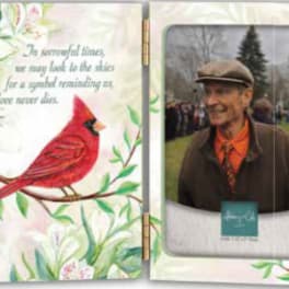 Sympathy card with a red cardinal and a photo of a man on the cover