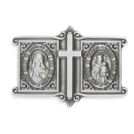 Silver religious plaque with a cross and two saint medallions