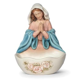 Praying woman figurine in a floral-decorated bowl