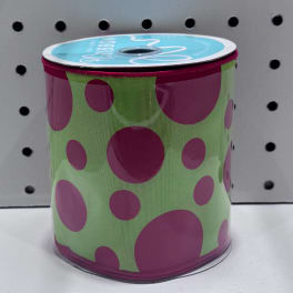Spool of lime green ribbon with large pink polka dots
