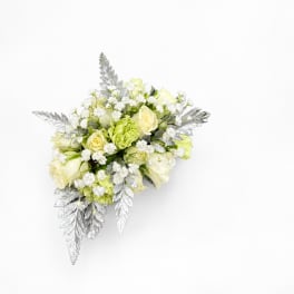 White and pale green bouquet with silver foliage on a white background