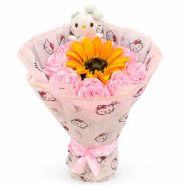 Pink rose bouquet with a sunflower and Hello Kitty plush topper