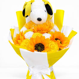 Sunflower bouquet with a Snoopy plush toy and yellow-white wrapping