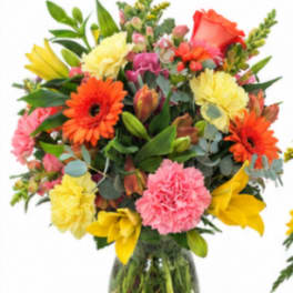 Colorful mixed bouquet in a clear glass vase