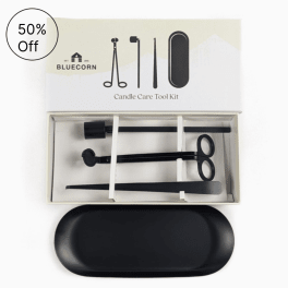 Candle care tool kit in a box with black tools and tray