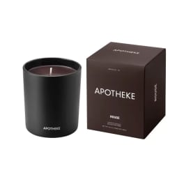 Black glass candle with matching dark box labeled Apotheke Rouge