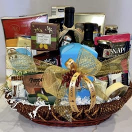 Gift basket with assorted gourmet foods and a gold ribbon
