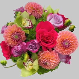 Colorful bouquet of roses, dahlias, and orchids