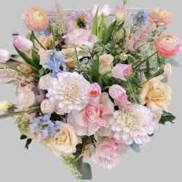 Large pastel bouquet with roses, tulips, and dahlias