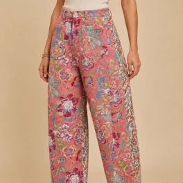 Person wearing floral-print wide-leg pants