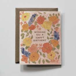 Birthday card with watercolor flowers and a brown envelope