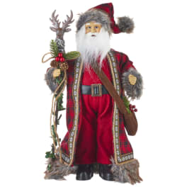 Santa figurine in a red plaid coat holding a staff and wearing a fur-trimmed hat