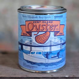 A can of Kent Island Oyster Co. oysters on a wooden surface