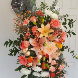 Orange and Peach Funeral Spray