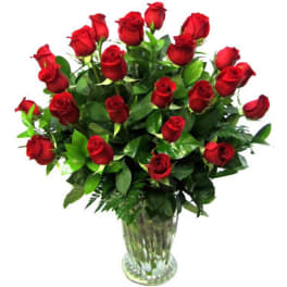 Bouquet of red roses in a clear glass vase