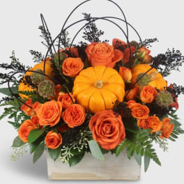 "A Floral Gift with a Touch of Whimsy: The Super Cute Orange Pumpkin Surprise"