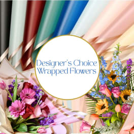 Wrapped mixed flower bouquets with roses, tulips, and sunflowers