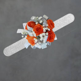 white and orange corsage