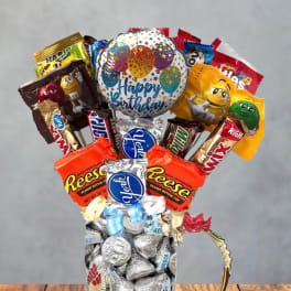 Pink Birthday candy bouquet in pretty tea glass