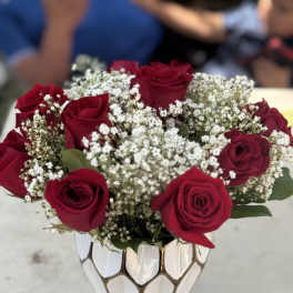 9 roses and baby breth