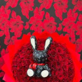 Glamour in Bloom: Red Rose Bouquet with Bunny Accent