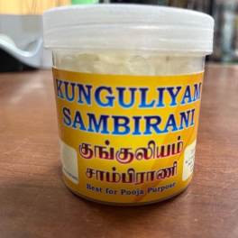 Plastic jar labeled "KUNGULIYAM SAMBIRANI" on a table