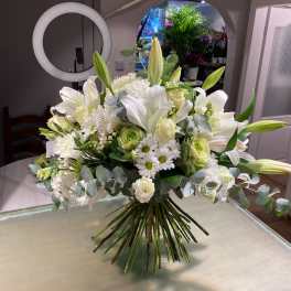 White lily and rose bouquet with daisies and eucalyptus