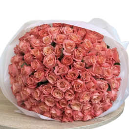 Bouquet of orange autumn roses in white packaging - 50 pieces