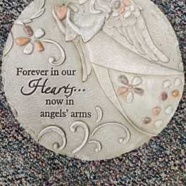 Round memorial plaque with an angel and the words 'Forever in our Hearts'