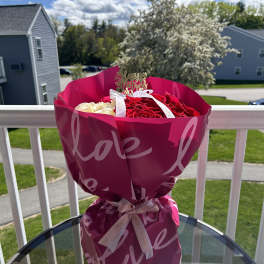 White and red roses with a bow