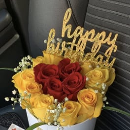 Red and yellow roses in a cute white box by lav.ishbouquets