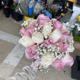 A pink and white rose bouquet
