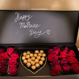 Red roses and Ferrero Rocher chocolates in a black Mother’s Day gift box