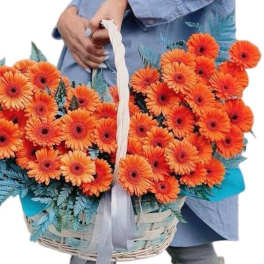 Large basket of orange daisies.