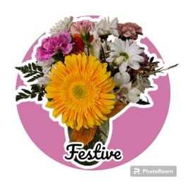 Mixed bouquet with a large yellow gerbera daisy and pink and white flowers