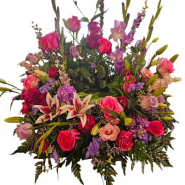 Large mixed bouquet with pink roses, lilies, and purple flowers