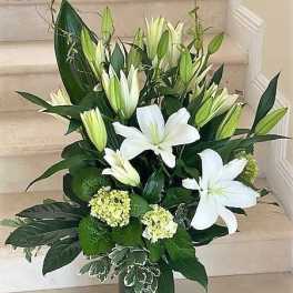 White Lilies arranged in a vase