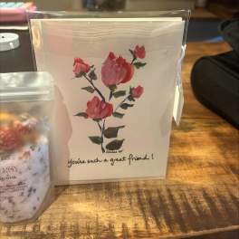 Greeting card with pink roses and the text 'You're such a great friend!'